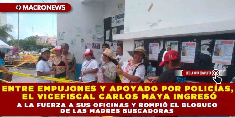Entre empujones y apoyado por policías, el vicefiscal Carlos Maya ingresó a la fuerza a sus oficinas y rompió el bloqueo de las madres buscadoras