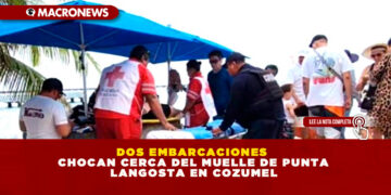 DOS EMBARCACIONES CHOCAN CERCA DEL MUELLE DE PUNTA LANGOSTA EN COZUMEL