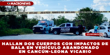 HALLAN DOS CUERPOS CON IMPACTOS DE BALA EN VEHÍCULO ABANDONADO EN CARRETERA DE CANCÚN