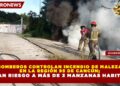 BOMBEROS CONTROLAN INCENDIO DE MALEZA EN LA REGIÓN 95 DE CANCÚN; EVITAN RIESGO A MÁS DE 3 MANZANAS HABITADAS